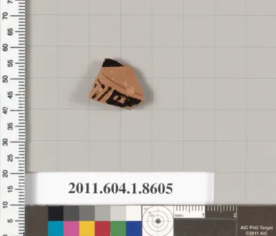 Terracotta fragment of a stemless kylix (drinking cup)