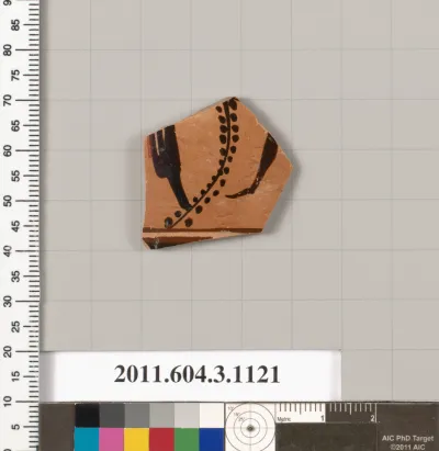 Terracotta fragment of a mastoid (drinking cup with narrow base) or a kyathos (cup-shaped ladle)