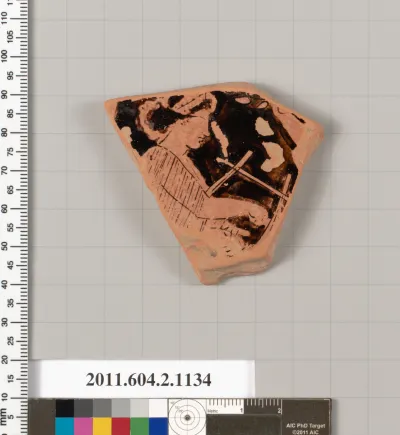 Terracotta fragment of a lekanis lid (covered dish)