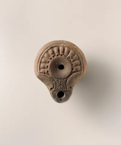 Terracotta oil lamp
