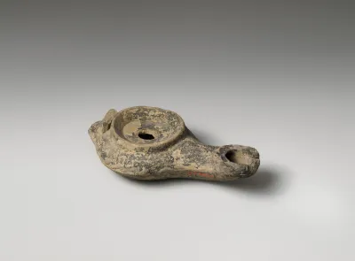 Terracotta oil lamp