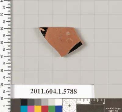 Terracotta fragment of a kylix: eye-cup  (drinking cup)