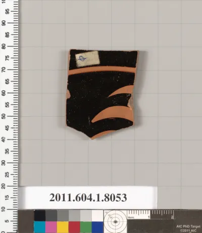 Terracotta fragment of a kylix (drinking cup)