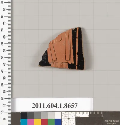 Terracotta fragment of a stemless kylix (drinking cup)