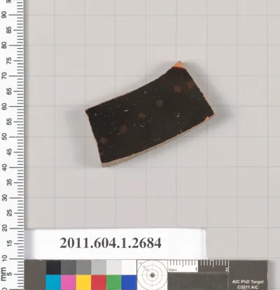 Terracotta fragment of a kylix (drinking cup)
