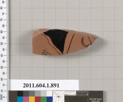 Terracotta fragment of a kylix (drinking cup)