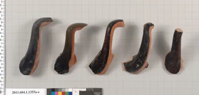 Terracotta fragments of kylikes (drinking cups)