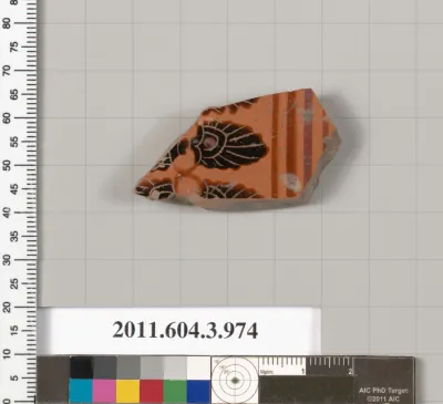 Terracotta fragment of a lekanis lid (covered dish)