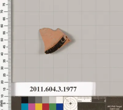 Terracotta fragment of a kylix (drinking cup)