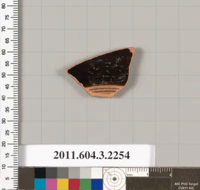 Terracotta fragment of a kylix (drinking cup)