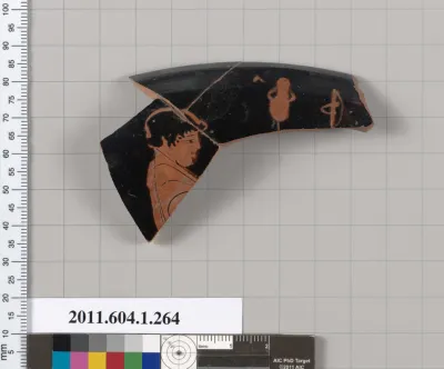 Terracotta fragment of a kylix (drinking cup)