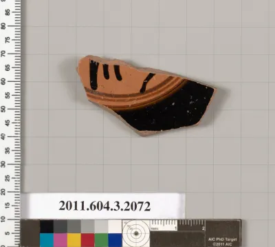Terracotta fragment of a kylix (drinking cup)