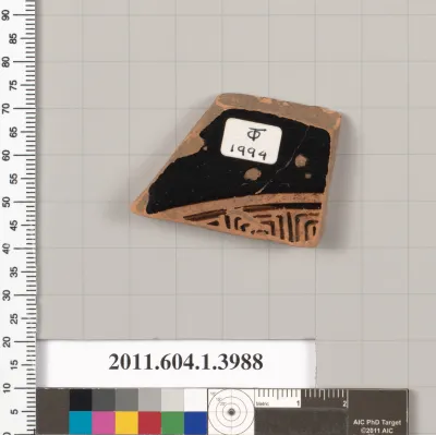 Terracotta fragment of a kylix (drinking cup)