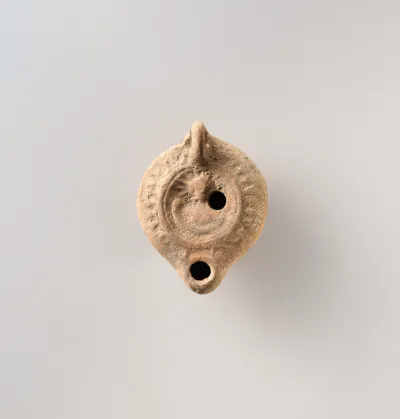 Terracotta oil lamp