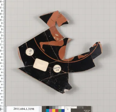 Terracotta fragment of a kylix (drinking cup)