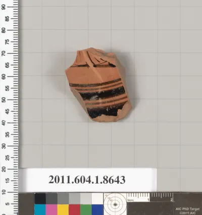 Terracotta fragment of a stemless kylix (drinking cup)
