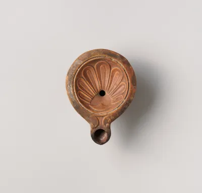 Terracotta oil lamp