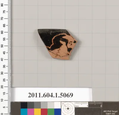 Terracotta rim fragment of a kylix (drinking cup)