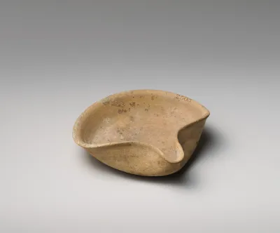 Terracotta saucer-shaped lamp
