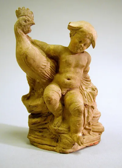 Terracotta statuette of a boy and a rooster