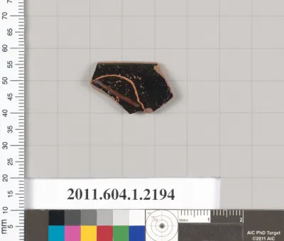 Terracotta rim fragment of a kylix (drinking cup)