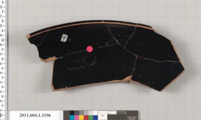 Terracotta rim fragment of a kylix (drinking cup)