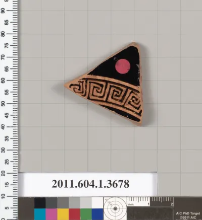 Terracotta fragment of a kylix (drinking cup)