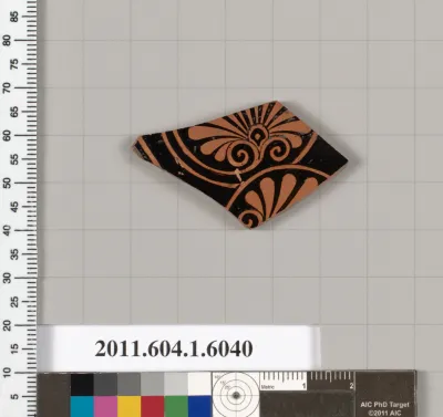 Terracotta fragment of a kylix (drinking cup)