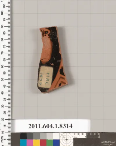 Terracotta fragment of a kylix (drinking cup)