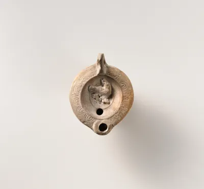 Terracotta oil lamp