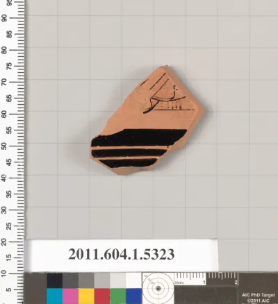 Terracotta fragment of a kylix (drinking cup)