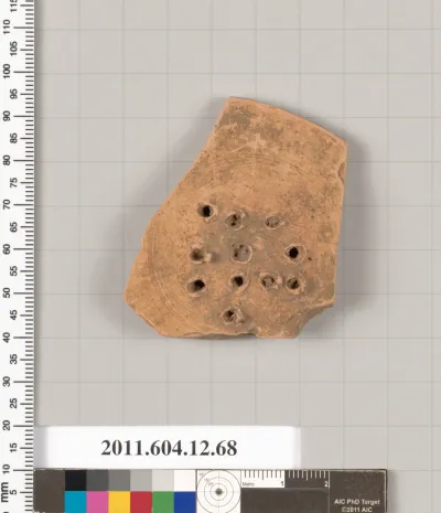 Terracotta fragment of a guttus (flask with handle and spout)