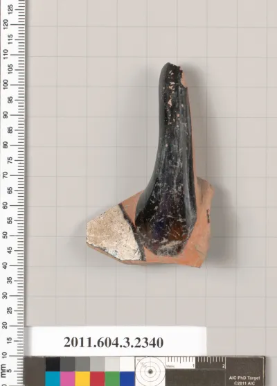 Terracotta fragment of a kylix: eye-cup (drinking cup)