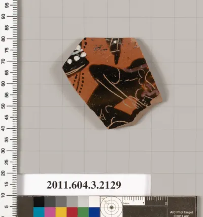 Terracotta fragment of a kylix (drinking cup)