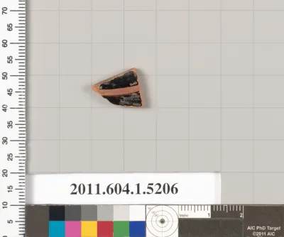 Terracotta fragment of a kylix (drinking cup)