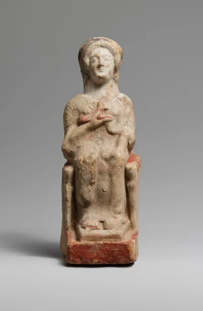 Terracotta statuette of a seated woman