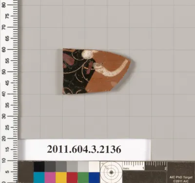 Terracotta fragment of a kylix (drinking cup)