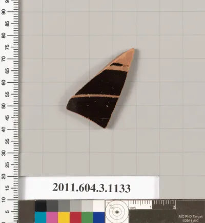 Terracotta fragment of a mastoid (drinking cup with narrow base) or a kyathos (cup-shaped ladle)