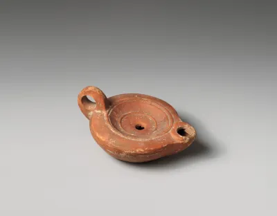 Terracotta oil lamp