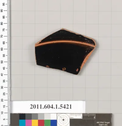 Terracotta fragment of a kylix (drinking cup)