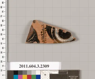 Terracotta fragment of a kylix: eye-cup (drinking cup)