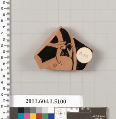 Terracotta fragment of a kylix (drinking cup)