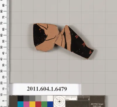 Terracotta fragment of a kylix (drinking cup)
