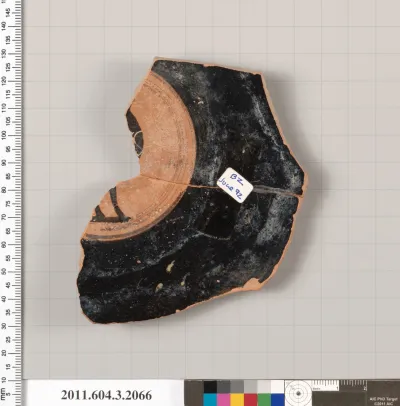 Terracotta fragment of a kylix (drinking cup)