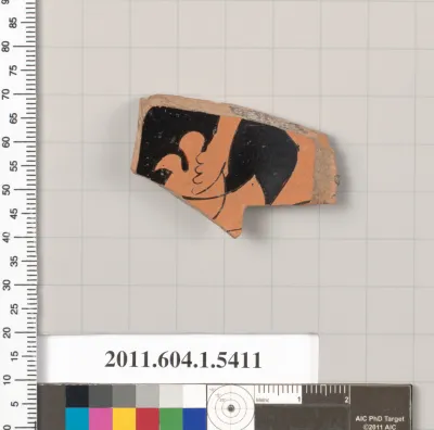 Terracotta fragment of a kylix (drinking cup)