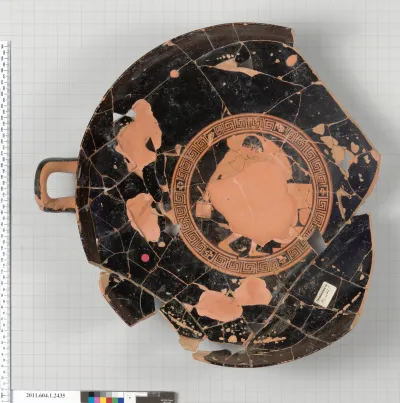 Terracotta fragment of a kylix (drinking cup)
