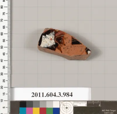 Terracotta fragment of a lekanis lid (covered dish)