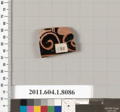 Terracotta fragment of a kylix (drinking cup)