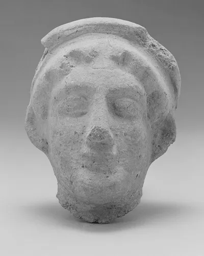 Votive Head
