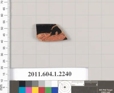 Terracotta rim fragment of a kylix (drinking cup)